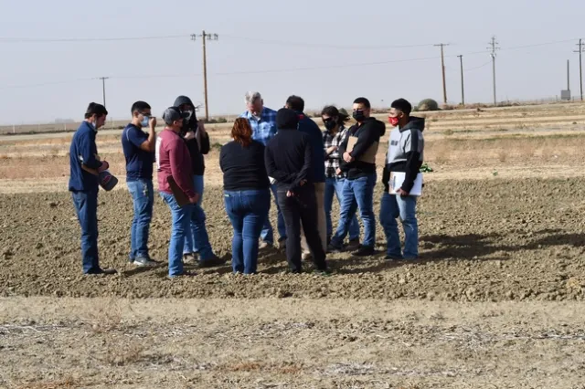 Photo 1.	Fresno State University agronomy students tour the 22-year conservation agriculture systems comparison field at the UC West Side Research and Extension Center in Five Points, CA on October 11, 2021. The group was hosted by Dan Munk, Joy Hollingsworth, and Jeff Mitchell.
