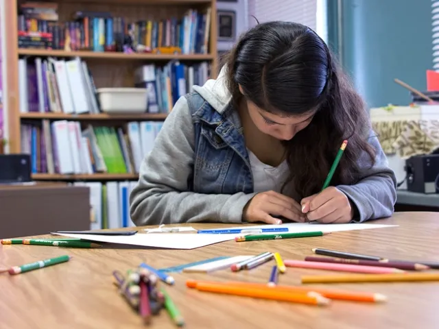Young person working at a desk
