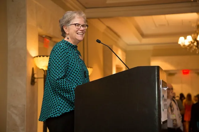 Linda J. Harris at a podium