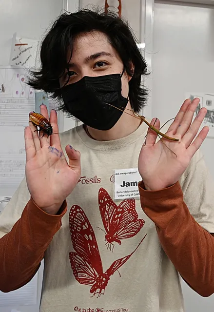 Show me your hands! Especially if they are showcasing insects! Insect enthusiast and Bohart Museum of Entomology volunteer James Heydon obliges during the UC Davis Biodiversity Museum Day. (Photo by Kathy Keatley Garvey)