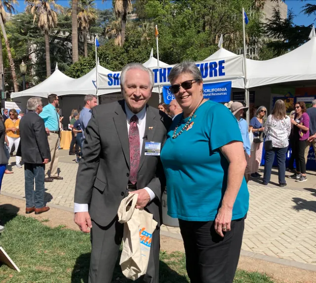 Nielsen holds a cloth ANR bag that reads 