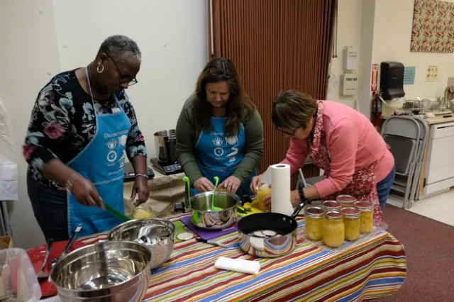 Three women can fruit.