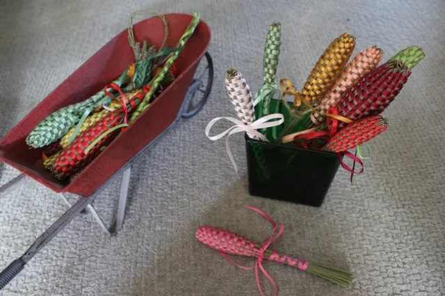 Stems of lavender twisted and weaved with ribbon to look like wands.