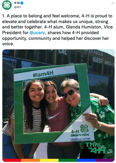 Glenda Humiston poses with 2 4-H youth in a frame that reads #Iam4H and 4-H grows here.