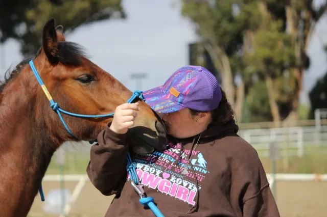 Morgan kisses Bowie on the nose
