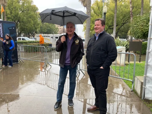 Assemblymember Jim Patterson talks with Gabe Youtsey.