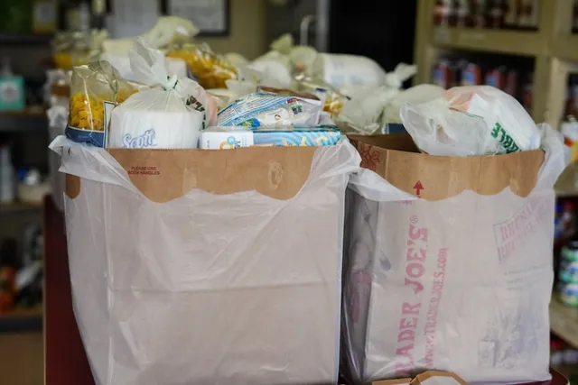 2 bags of groceries on a table