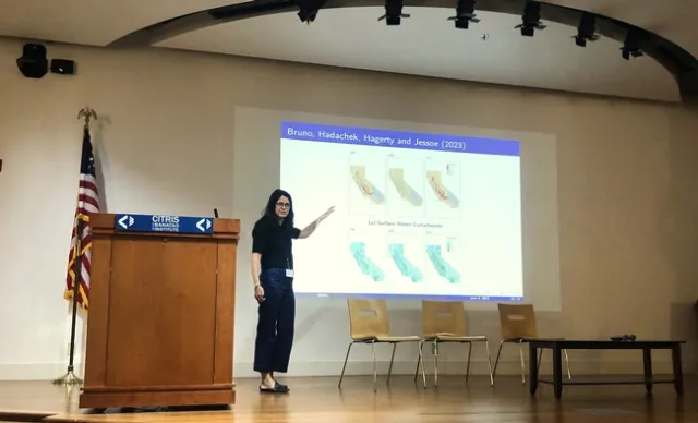 UC Davis Professor Katrina Jessoe presents research on the impacts of groundwater pricing. Photo by Ellen Bruno.