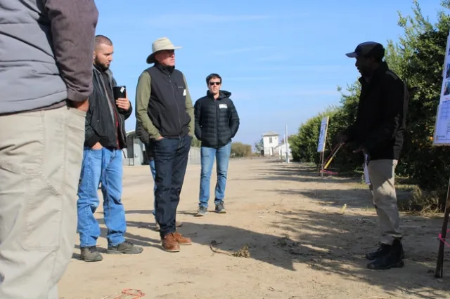 Dr. Peter Larbi engaging with participants to address their questions.