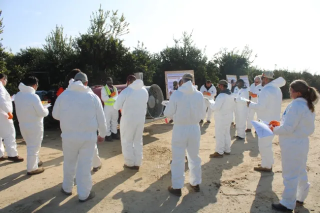 UCCE specialist Dr. Peter Larbi leading hands-on experience.