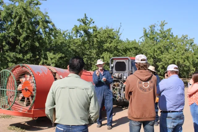 UCCE farm advisor Dr. Franz Niederholzer leading calibration training section in Arbuckle, CA