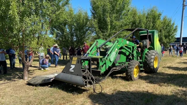 Electrical weed control device, made by the Brazilian company Zasso, demonstrated at Weed Day 2023. (Trina Kleist/UC Davis)