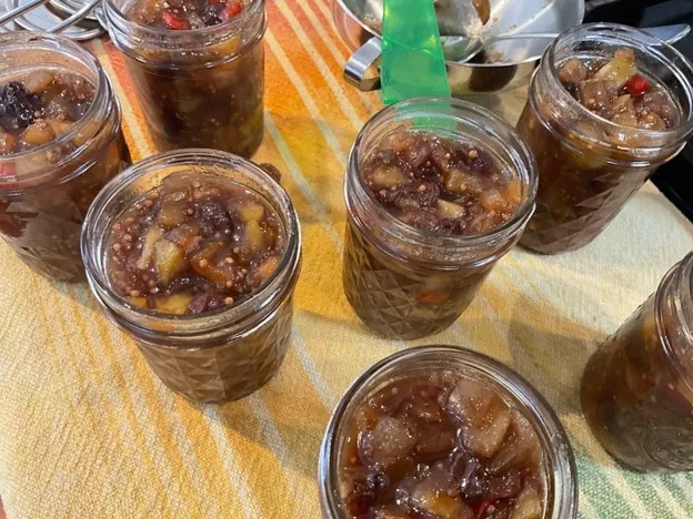Chutney in open jars on countertop