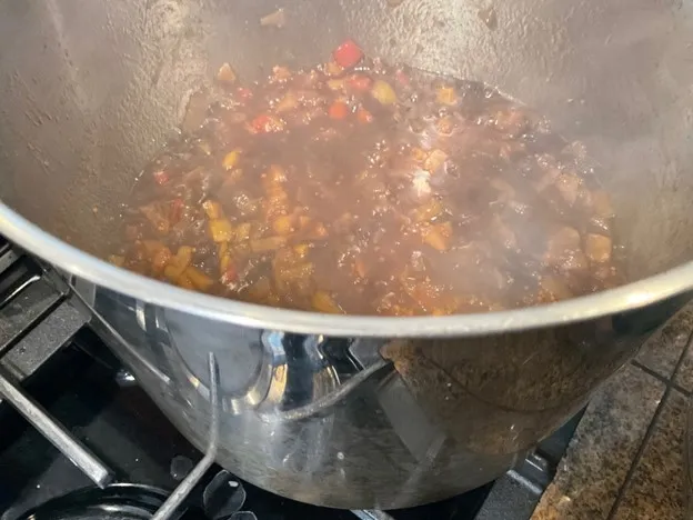 Mixture simmering and darkening