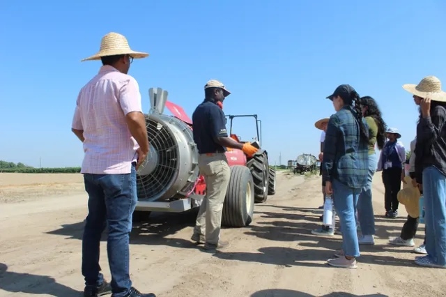 UCCE specialist Dr. Peter Larbi talking about pesticide spray application for orchards and vineyards
