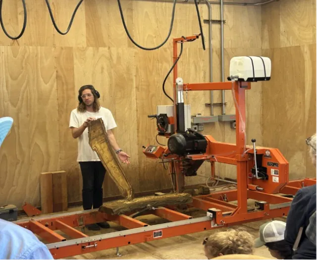 Mayencourt demonstrating the Wood-Mizer Mill at the UC Berkeley Richmond Field Station. Credit: K.Reidy.