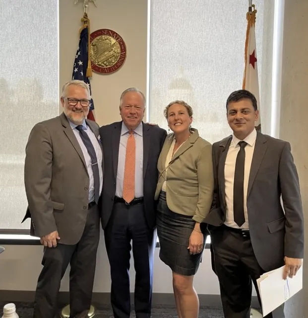 From left, Brent Hales, Senator Bill Dodd, Lenya Quinn-Davidson and Haris Gilani.