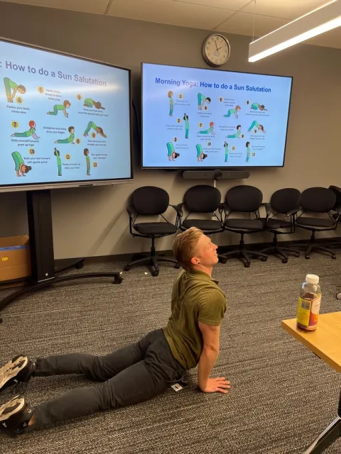 Ryan Williams led children in a yoga exercise.