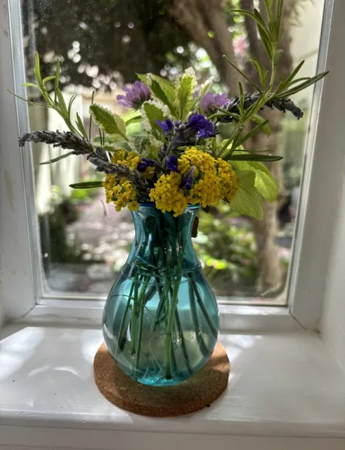 Yarrow 'Little Moonshine' with salvia, pincushion flowers and herbs