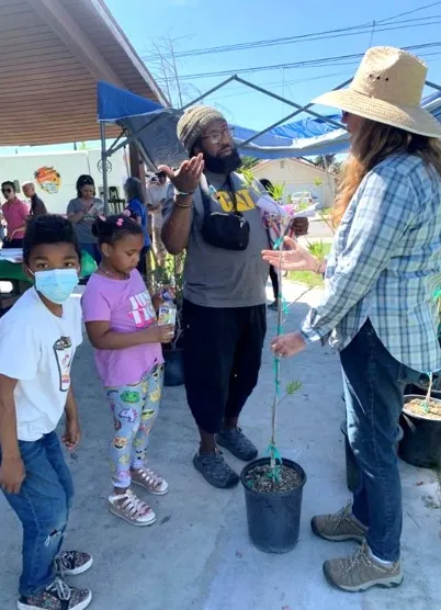 UC Master Gardener volunteers interact with community members during a TFTST event.