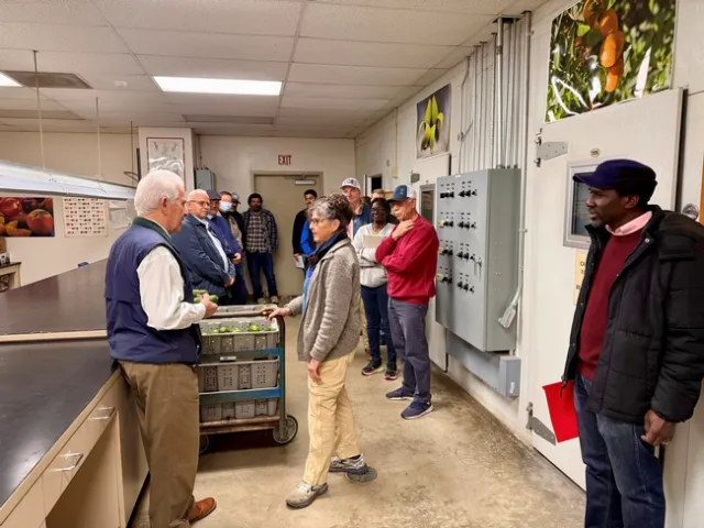 Rep. Jim Costa, left, listened as Mary Lu Arpaia talked about her research on postharvest handling and oil extraction from different avocado varieties grown at Lindcove REC and South Coast REC.