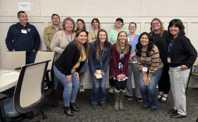 BOC Business Partner Team 6 with their county office partners.Top row from left: Gordon Riggs, Danny Wong, Annette Cosgrove, Uvea Grace, Marie Malloy, Sam Clawson, Sara Jaimes, Carrie Adams, Zeva Cho Bottom row from left: Janelle Wood, Samantha Brown, Cassandra Knisley, Natasha Curtice.