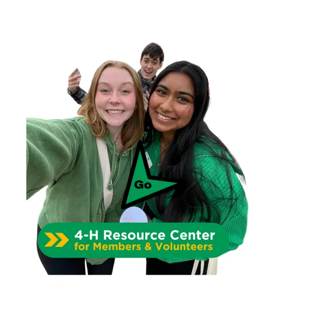 2 youth in front and one in background posting for camera