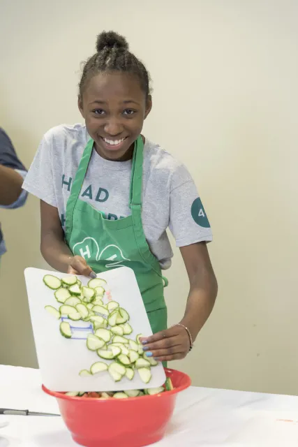 Healthy Living projects include learning about nutrition and cooking.