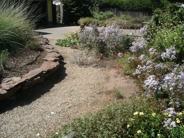 Curb appeal. Berm with dry stacked flagstones. Cindy Weiner