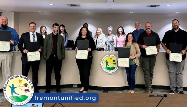 FUSD department heads receiving recognition for the Golden Bell Award 2024.