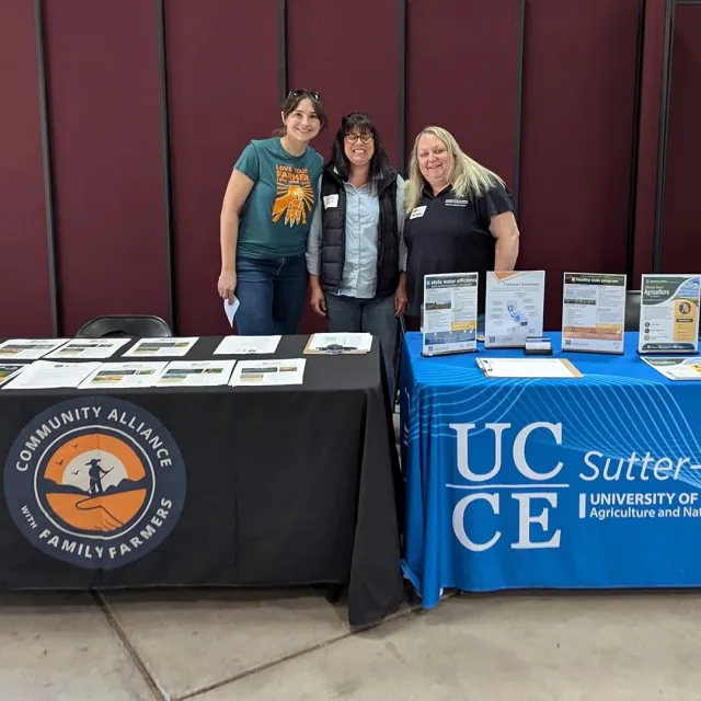 Representatives from CAFF and UCCE at the in-person networking event for the California Small Farm Conference