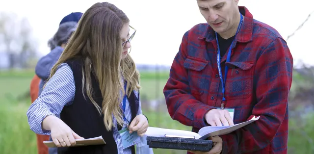 Two people coordinating event.