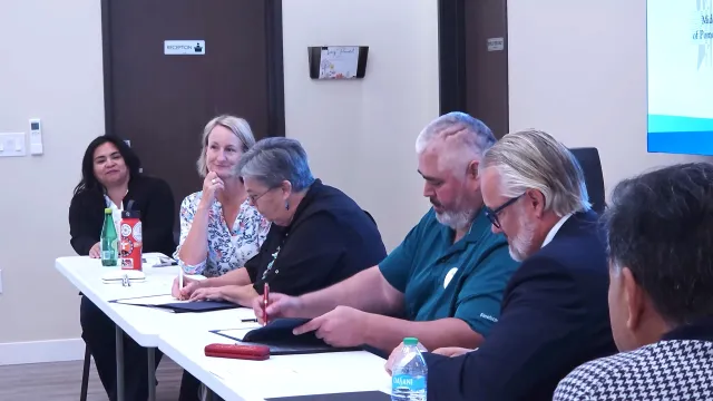 Middletown Rancheria Tribal Chairman Moke Simon and Vice President Glenda Humiston put pen to paper during MOU signing ceremony