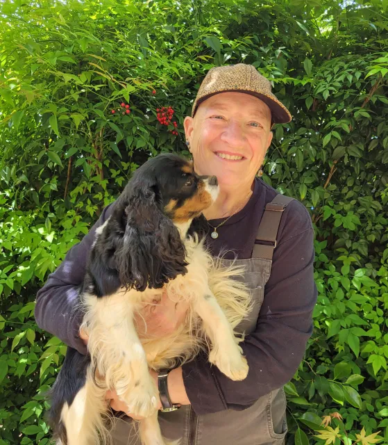 Golden Clover.Robert Brownlee - Johnna Humber holding dog