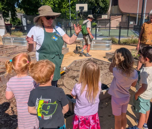 Kids Learning about Plants at Summer Camp session in Chapman Teaching Garden. Laura Lukes