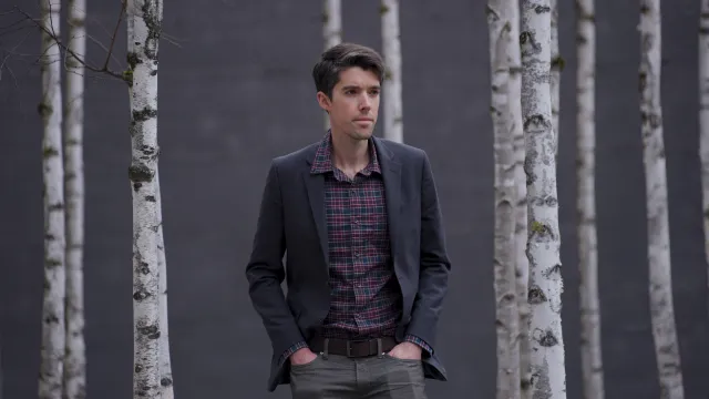 Swain walks among trees