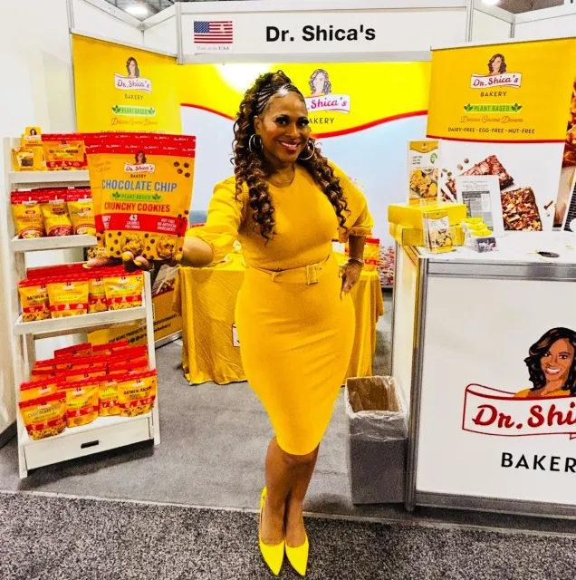 Woman holding a bag of chocolate chips cookies