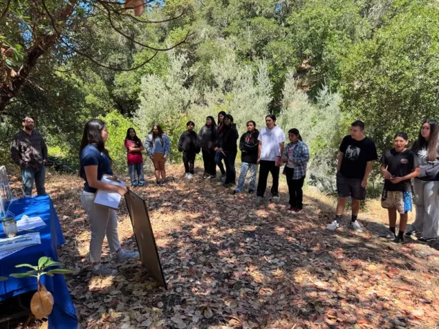 Laura Garza teaches tribal youth participants about surface-groundwater interactions