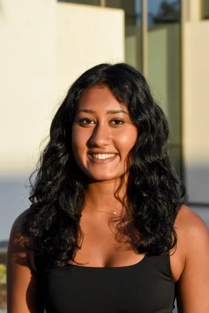 A headshot of a young person