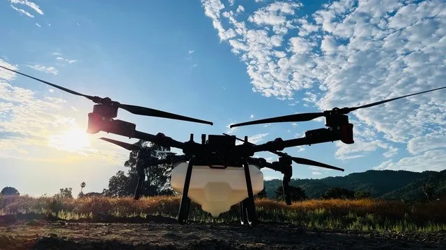 Spray drone in a farm field