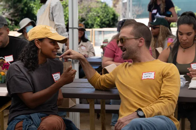 Jessica Handy talks to another participant of an agritourism workshop