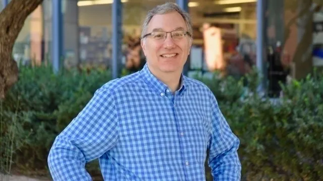 Headshot of David Block standing outdoors
