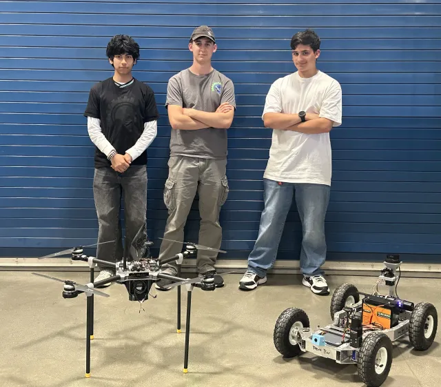 CTEC Titans of Career Technical Education Charter High School pose with their drone and rover device