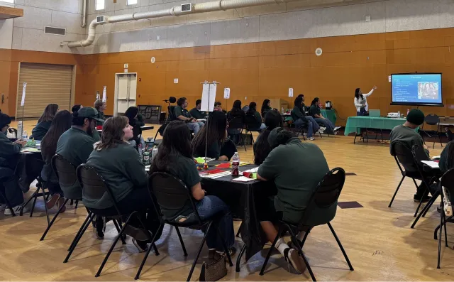 Melissa Guillen and Ella Mitchell present a youth development training