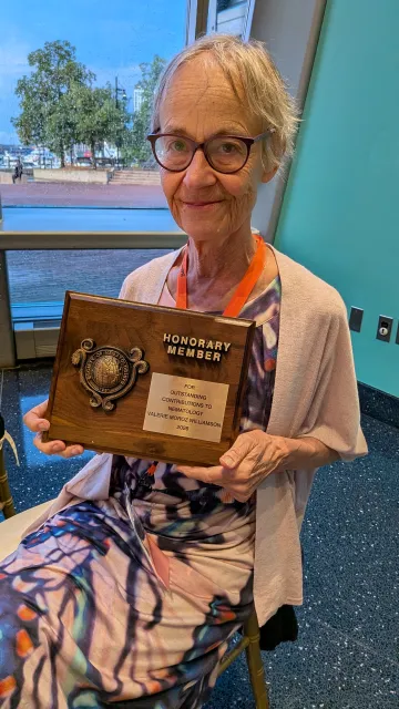 UC Davis Professor Emerita Valerie Williamson with her award