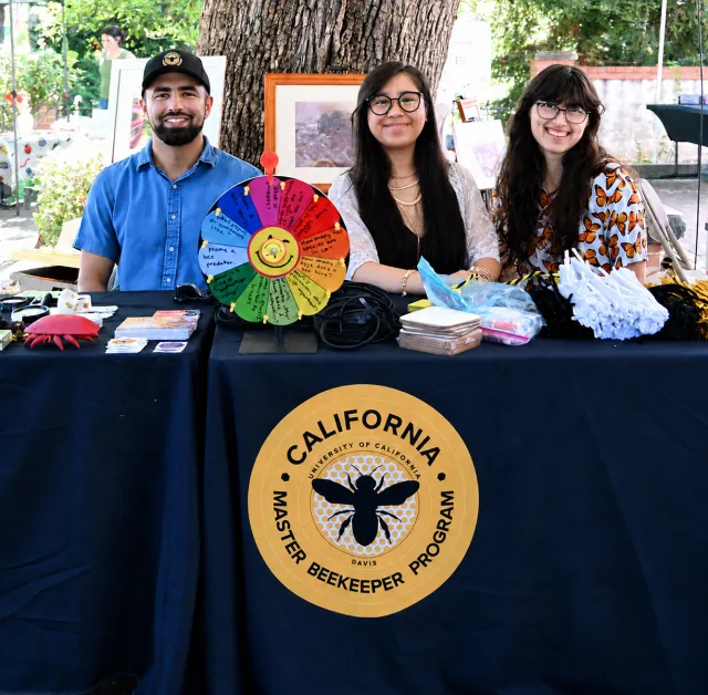 Kian Nikzad, co-program manager of the California Master Beekeeper Program (CAMBP), Abi Moreno, senior at UC Davis studing global diseases, and Samantha Murray, education and garden coordinator, UC Davis Bee Haven. Nikzad and Murray are members of the E. L. Nino bee lab at UC Davis.