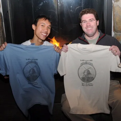 TO BEE OR NOT TO BEE--Yao Hua Law (left) and Randy Veirs hold up the "To Bee or Not to Bee" t-shirt. It is intended to do double duty: to raise funds for the UC Davis Entomology Graduate Students' Association and to raise awareness for the plight of honey bees. (Photo by Kathy Keatley Garvey)