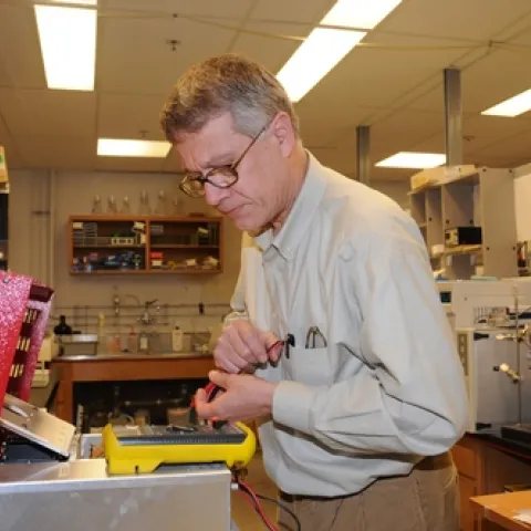 CHEMICAL ECOLOGIST Walter Leal works in his lab in the Department of Entomology, University of California, Davis. (Photo by Kathy Keatley Garvey)