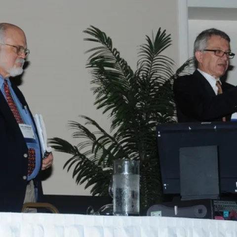 CHEMICAL ECOLOGISTS John Hildebrand (left) of the University of Arizona and Walter Leal of the University of California, Davis, organized and moderated a lively discussion at their seminar at the Entomological Society of America's 58th annual meeting, held recently in San Diego. (Photo by Kathy Keatley Garvey)