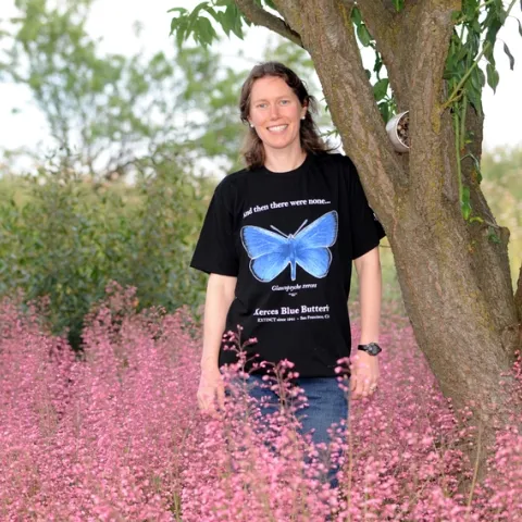 Tabatha Yang, outreach and education coordinator at the Bohart Museum, wearing a Xerces Blue Butterfly shirt. (Photo by Kathy Keatley Garvey)